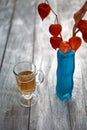 Glass beer on wood background. physalis Royalty Free Stock Photo