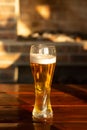 Glass of beer on wooden table, closeup. Royalty Free Stock Photo