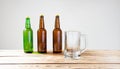 Glass of beer on wooden table, top view. Beer bottles. Selective focus. Mock up. Copy space.Template. Blank.