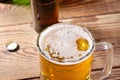 Glass of beer on wooden table, top view. Beer bottles. Selective focus. Mock up. Copy space.Template. Blank.