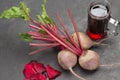 Glass of beetroot juice. Beets with tops, sliced beets