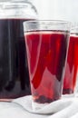 Glass with berry compote on a wooden table