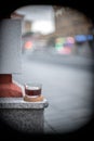 Glass with black filter coffee on the city street bokeh marble coffeebreak Royalty Free Stock Photo