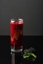 Glass of blackberry smoothie on black background. Healthy drink. Royalty Free Stock Photo