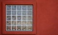 Glass block window red wall Royalty Free Stock Photo