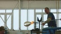Glass blowers make a new vase. Workshop of glass production at the Preciosa glass manufacturer, November 2021, Jablonec