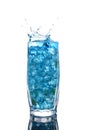 Glass of a blue alcoholic cocktail drink with ice and mint Royalty Free Stock Photo