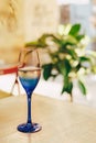 Glass of blue color with champagne table i Royalty Free Stock Photo