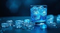 Glass with blue drink and ice on dark background Royalty Free Stock Photo