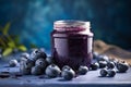 Glass of blueberry fruit jam