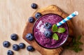 Glass of blueberry smoothie Royalty Free Stock Photo