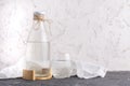 glass bottle with absolutely clean distilled water isolated on grunge surfaces