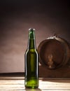 Glass bottle of beer on brown background Royalty Free Stock Photo