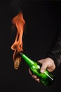 Glass bottle, the so-called Molotov cocktail in the hand of the