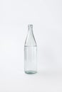 Glass bottle with calm mineral water Royalty Free Stock Photo