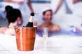 Glass and bottle of champagne in bucket, hen party Royalty Free Stock Photo