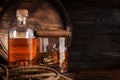 Glass and bottle with cognac Royalty Free Stock Photo