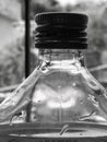Glass bottle with contain water in vintage Royalty Free Stock Photo
