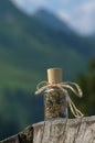 Glass bottle with dried herbs