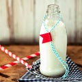 Glass bottle of fresh farm milk Royalty Free Stock Photo