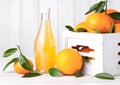 Glass  bottle of fresh mandarin tangerine juice Royalty Free Stock Photo