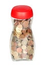 Glass bottle full of coins