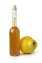 Glass bottle of homemade quince liqueur