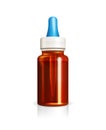 Glass bottle with medicine dropper Royalty Free Stock Photo