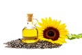 Glass bottle with natural sunflower oil and sunflower flower with black seeds on transparent background Royalty Free Stock Photo