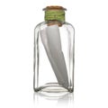 Glass bottle with note Royalty Free Stock Photo
