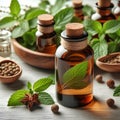 glass bottle of patchouli essential oil on white background