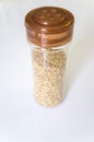 Glass bottle sesame or ajonjoli grains