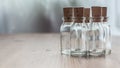 Glass bottle on a table, center Royalty Free Stock Photo