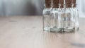 Glass bottle on a table, center Royalty Free Stock Photo