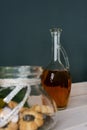 Glass bottle of unrefined sunflower oil in the kitchen