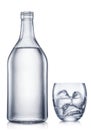 Glass and bottle of vodka, chilled alcohol drink, on white background. Clipping path Royalty Free Stock Photo