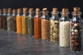 Glass bottles with different spices Royalty Free Stock Photo
