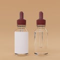 Glass bottles with dropper. Empty label. Liquid medicine container bottles. Royalty Free Stock Photo