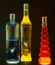 glass bottles filled with colored liquids Royalty Free Stock Photo