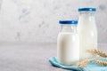 Glass bottles of fresh milk on a table Royalty Free Stock Photo