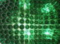 glass bottles with indirect light in green color, viewed from below, background and texture