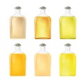 Glass bottles with liquid, transparent containers for different products Royalty Free Stock Photo