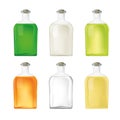 Glass bottles with liquid, transparent containers for different products Royalty Free Stock Photo