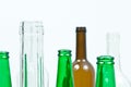 Glass bottles of mixed colors including green, clear white, brow Royalty Free Stock Photo