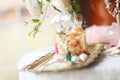 Glass bottles of perfume and spices on the table. Royalty Free Stock Photo