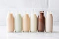 glass bottles of plant-based protein shakes