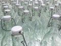 Glass bottles set in rows Royalty Free Stock Photo