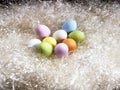 Glass bottles for spices and oils. recycled packaging. Ecopackaging. Zero waste products.colorful easter eggs in a nest close-up.