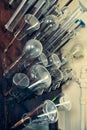 Glass bottles, test tubes, flasks and cups in an old chemical laboratory Royalty Free Stock Photo