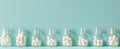 Glass bottles with white homeopathic pills on blue background. Homeopathy medicine. Concept of alternative medicine Royalty Free Stock Photo